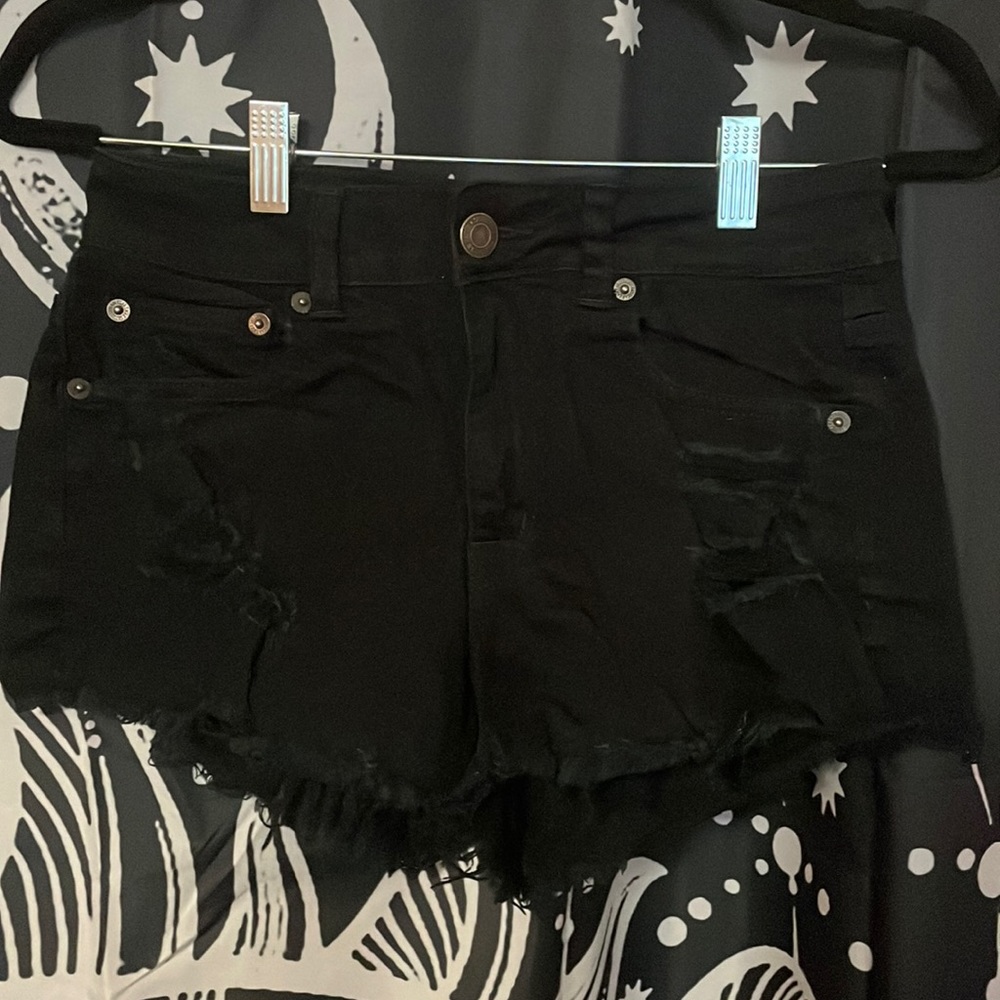 Black ripped fringe shorts
